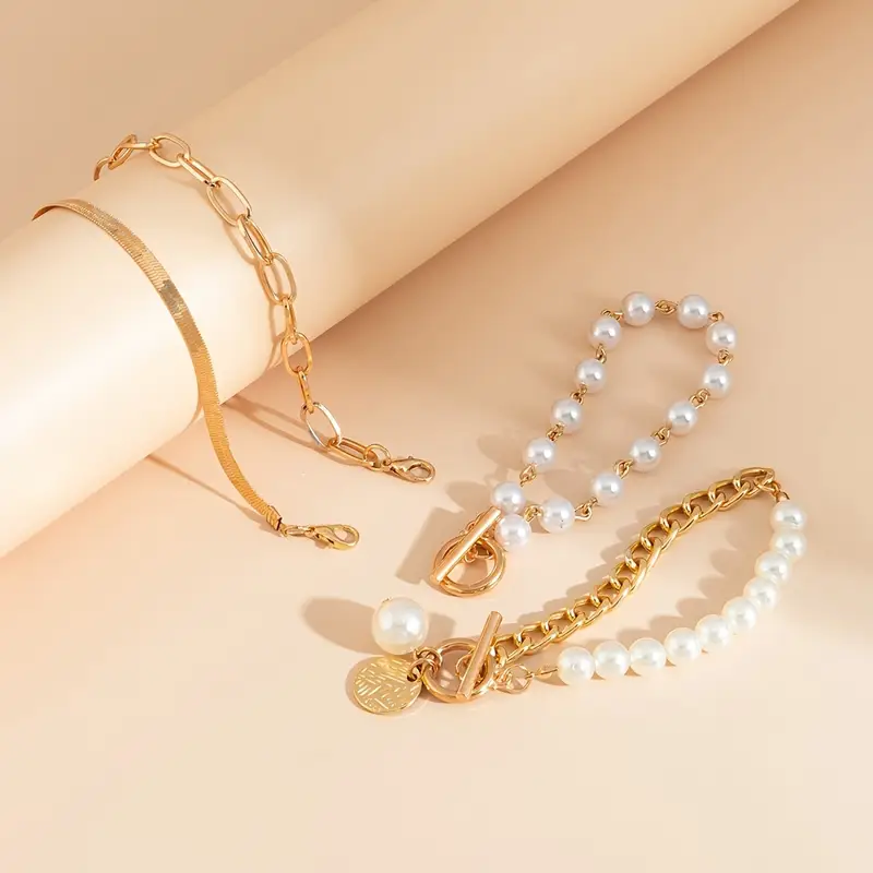 Chic Gold 4-Piece Bracelet Set – Snake, Pearls & Links | Gold - Image 4