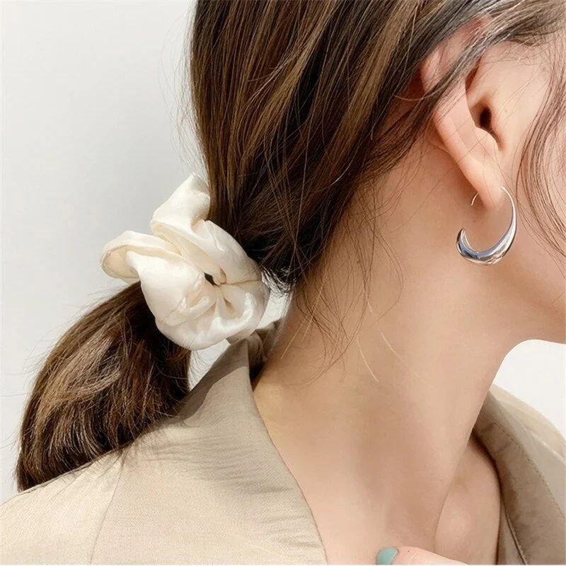 Luxurious Gold and Silver Earrings - Image 3